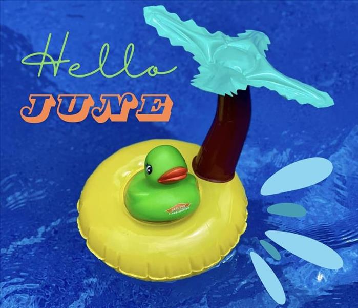 hello June photo with SERVPRO duck