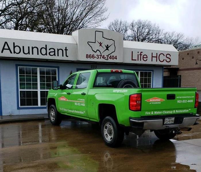 SERVPRO of Texarkana parked outside a building